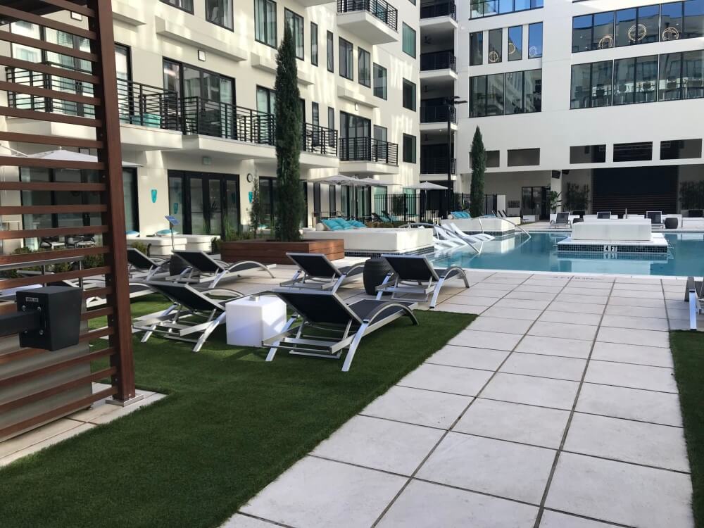 Apartment pool area with SYNLawn artificial grass