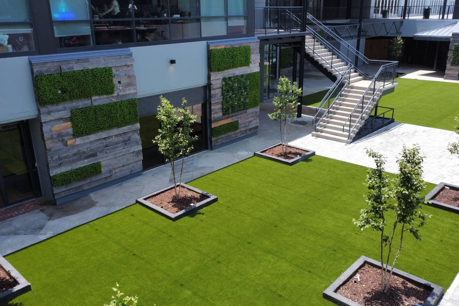 Artificial grass landscape with artificial green wall panels