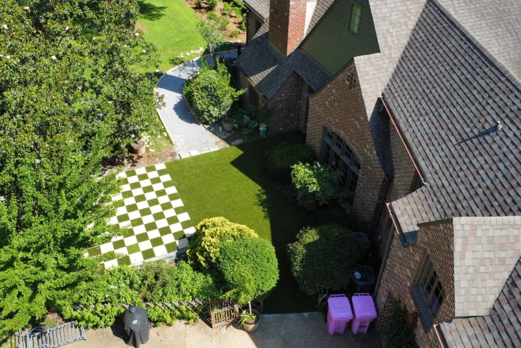 backyard with artificial grass chess board
