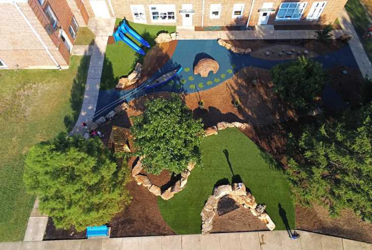 Drone shot of artificial grass playground