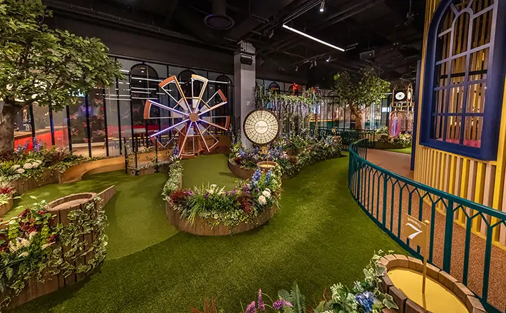 Ferris wheel on artificial grass mini golf course