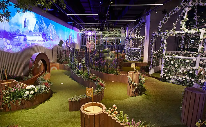 Artificial grass mini golf course with loop