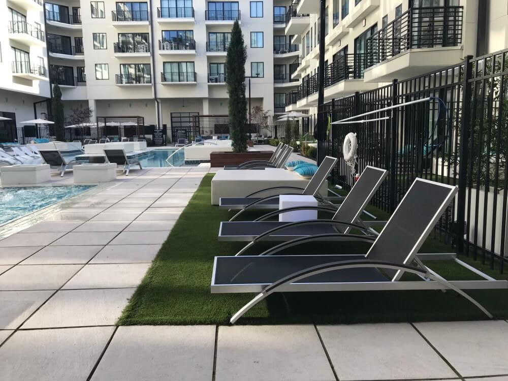Commercial artificial grass pool area installed by SYNLawn