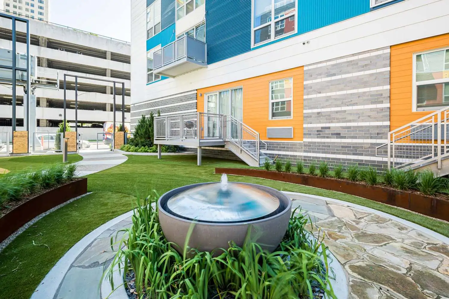Artificial grass courtyard installed by SYNLawn Georgia