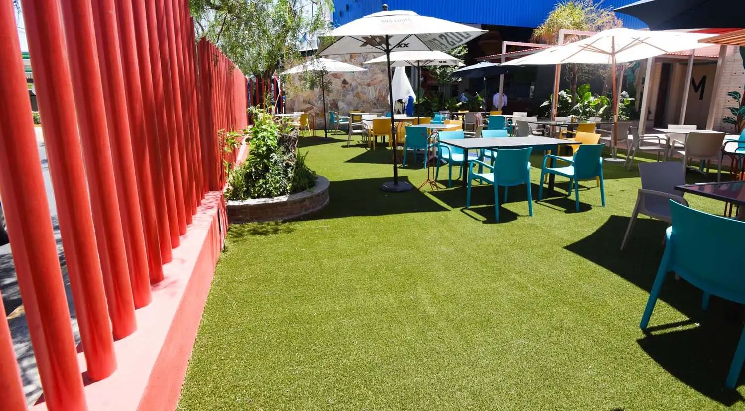 Artificial grass restaurant patio installed by SYNLawn