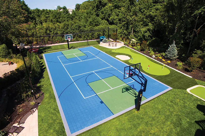 Residential basketball court installed by SYNLawn Georgia